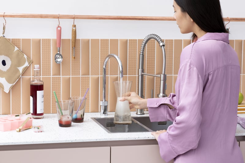Quooker Nordic Round in chrome boiling water tap — single tap, tap in a real customer kitchen. Genuine Quooker product supplied by Watertap.eu.