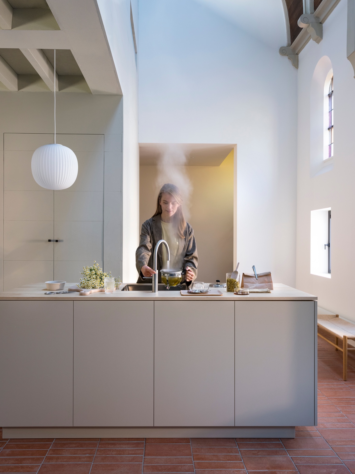 Quooker Fusion Round stainless steel with boiling tea and sparkling water styling in a monumental kitchen