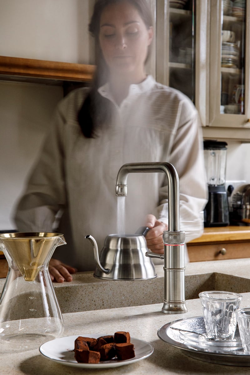 Quooker Classic Fusion Square boiling water tap — filling a teapot in a real customer kitchen. Genuine Quooker product supplied by Watertap.eu.